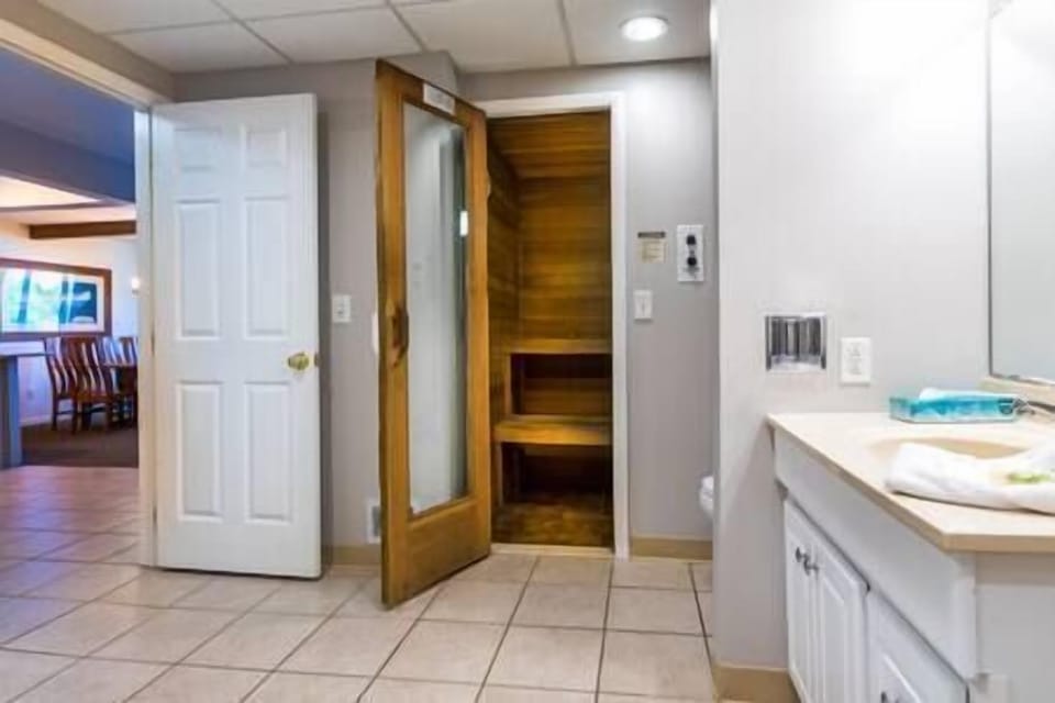 Entry into dry sauna in main level bath