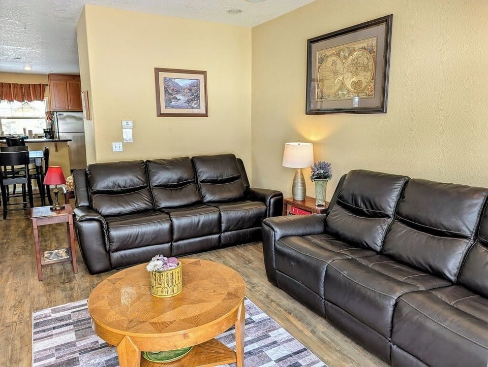 Reclining leather couches in the living room area