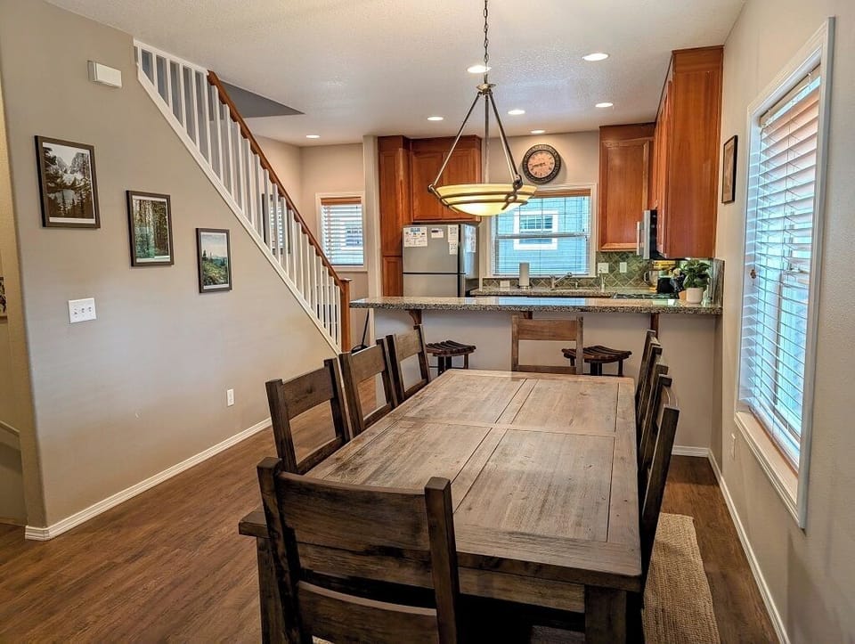 Large wood dining table with seating for 8