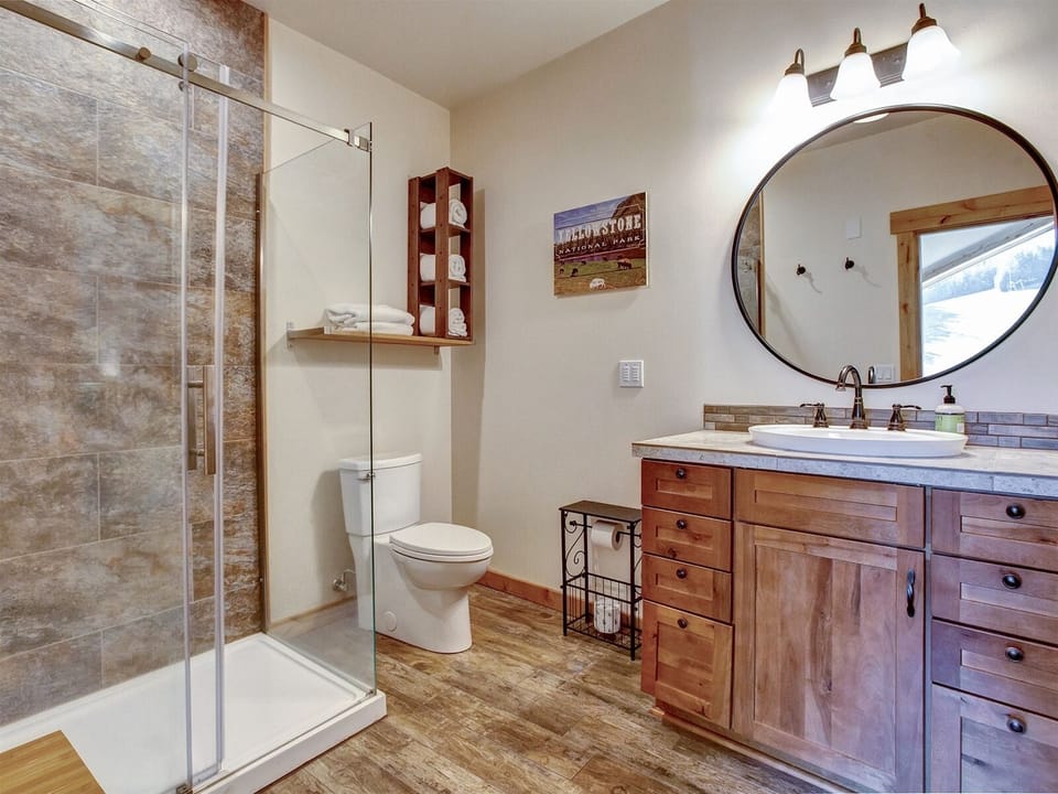 Bathroom shared by bunk room and guest bedroom on loft level.