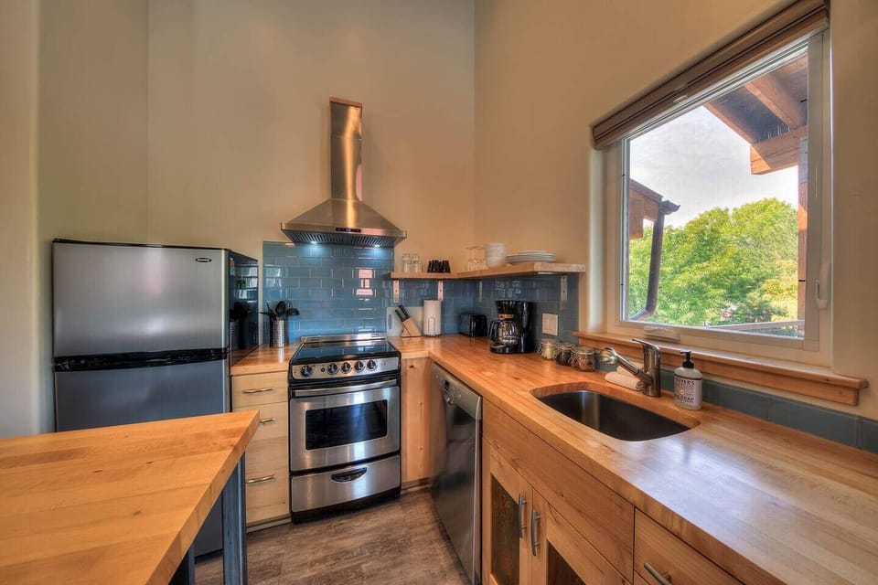 Beautiful kitchen with butcher block counter tops