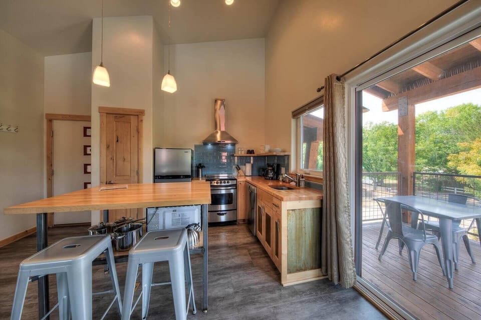 Beautiful kitchen with island and custom butcher block counters