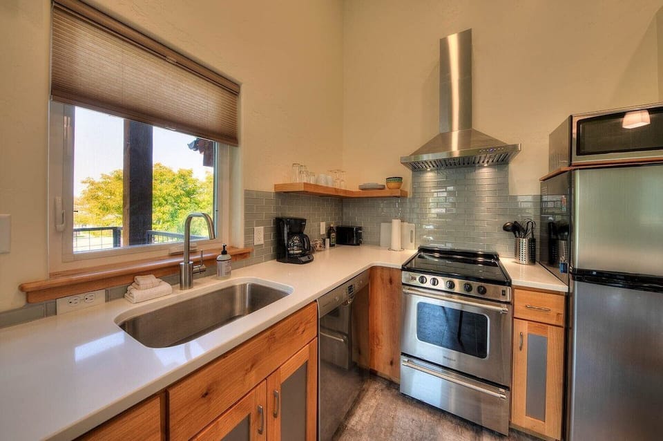 Customized kitchen with island seats 2 and nice appliances
