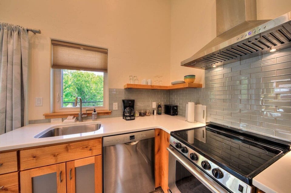 Nice range with vented hood and space to prep meals