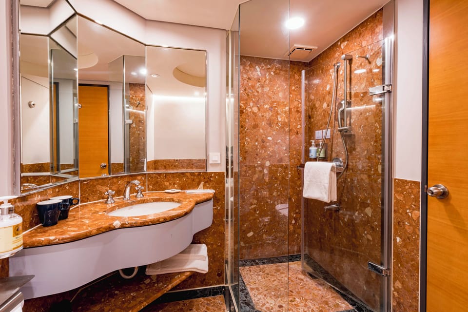 Hair dryer, slippers, towels, soap