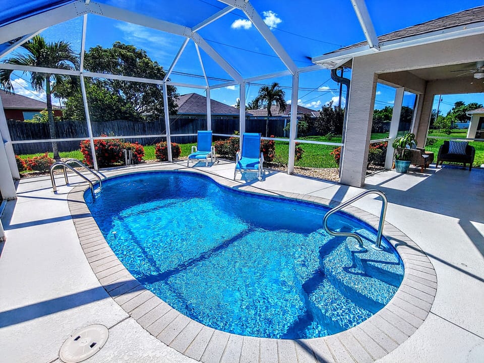 Enclosed Pool Cage to keep bugs out.