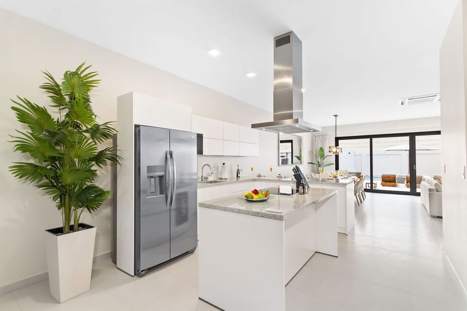 Culinary dreams come to life in our fully equipped kitchen, where cutting-edge stainless-steel appliances meet modern convenience. Your gourmet haven awaits.
