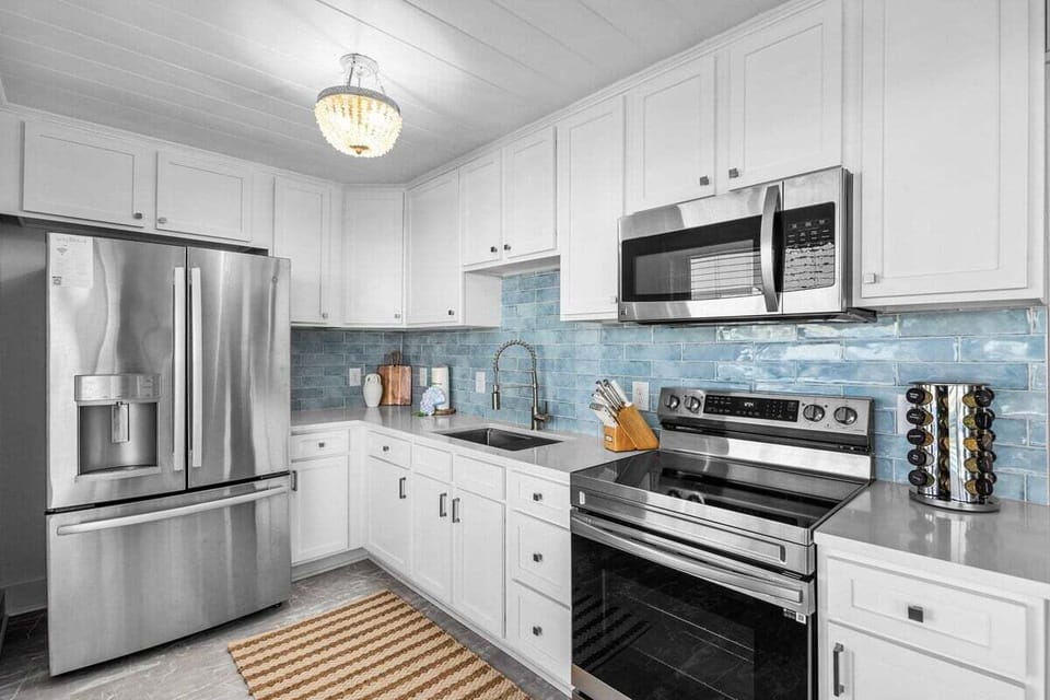 Step into our well-equipped kitchen—a culinary haven where every meal becomes a masterpiece.