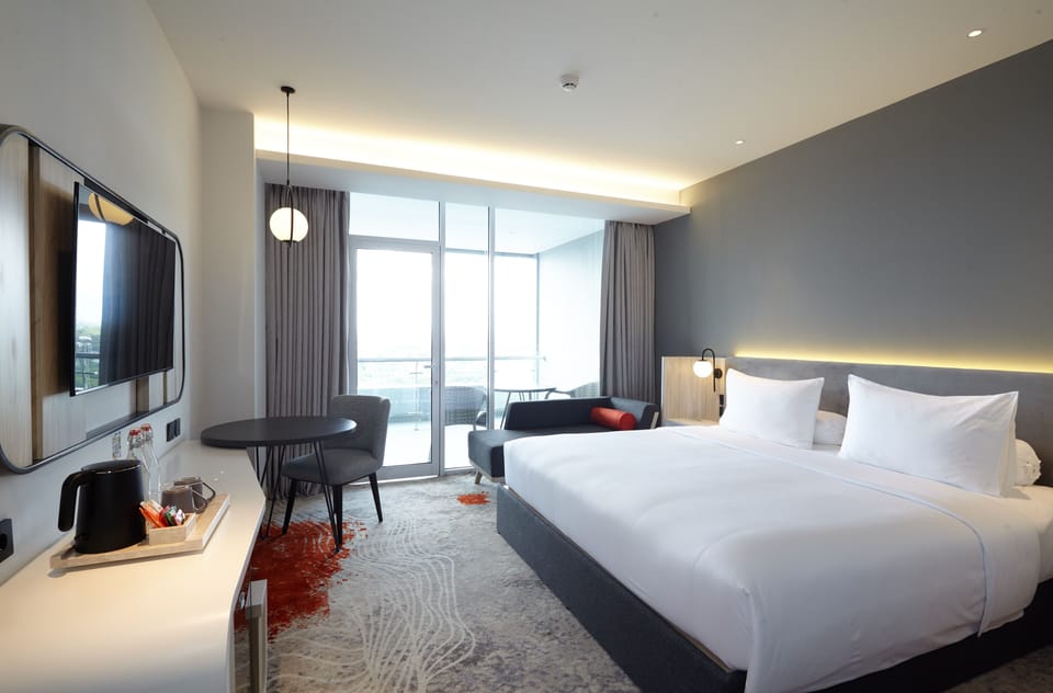 Room, Balcony (HARRIS) | Minibar, in-room safe, desk, laptop workspace