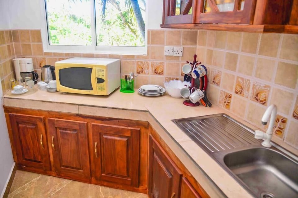 Comfort Apartment | Private kitchen | Full-size fridge, microwave, oven, toaster