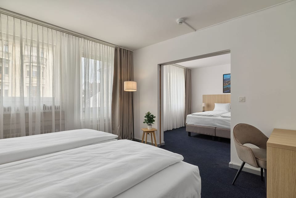 Family Two Bedroom | Hypo-allergenic bedding available, down comforters, in-room safe