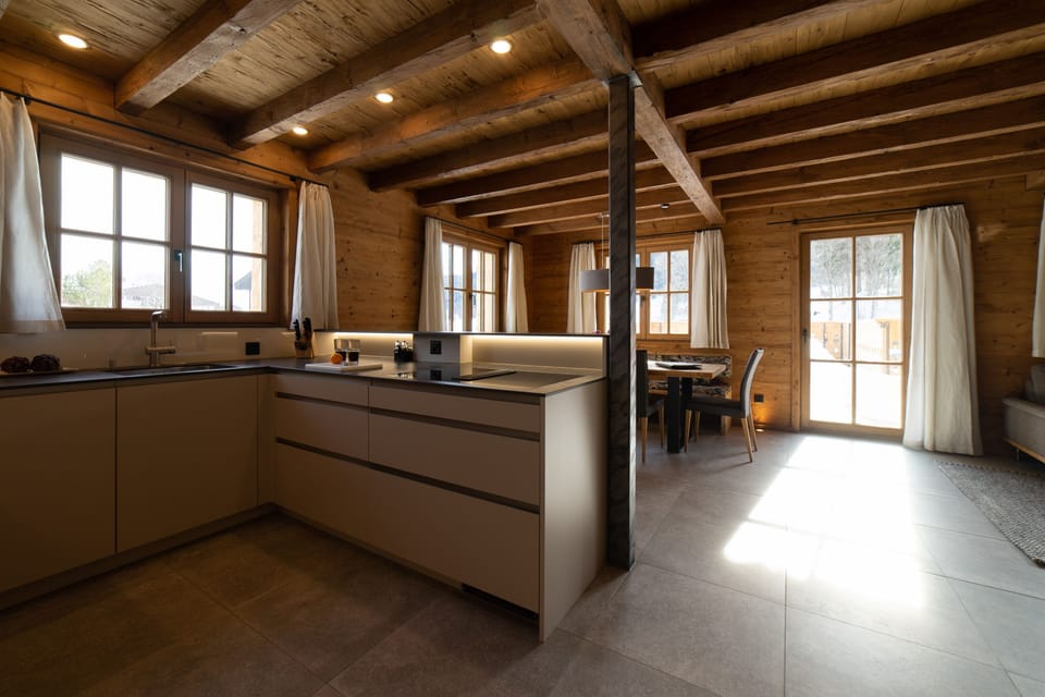Open kitchen with island and adjoining dining area