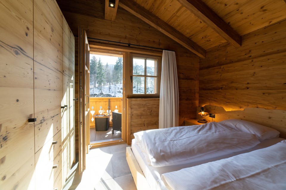 Bedroom with double bed and access to the balcony