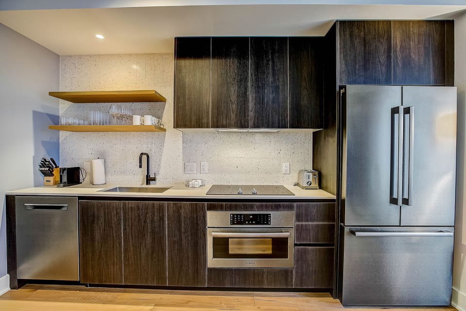 Luxury Condo, 2 Bedrooms, Balcony, City View | Private kitchen | Full-size fridge, microwave, stovetop, dishwasher