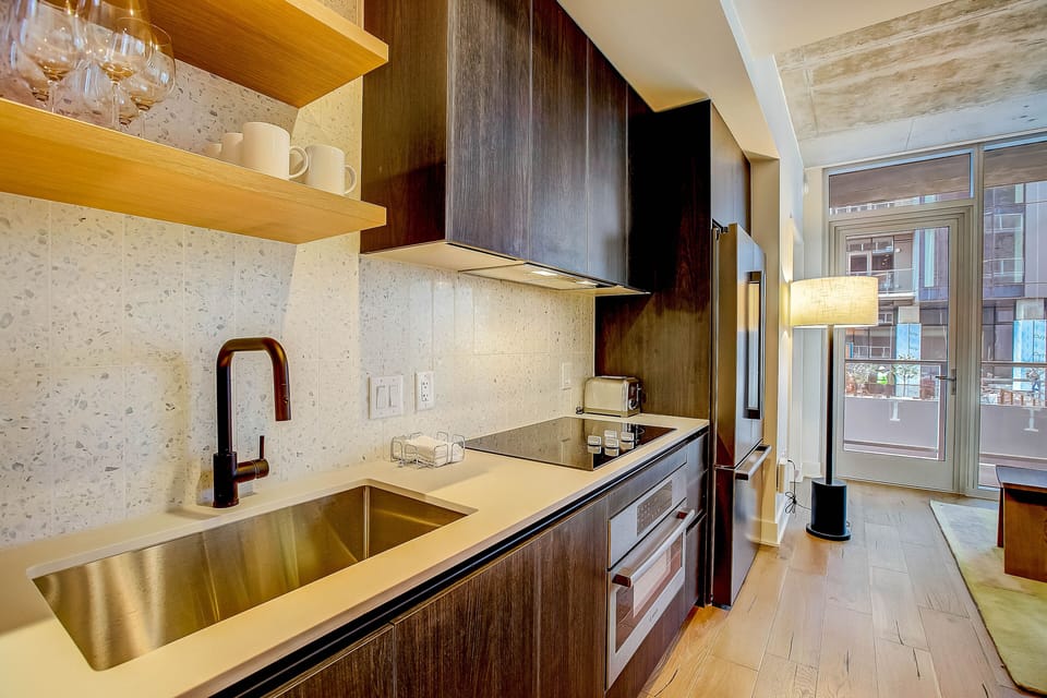 Luxury Condo, 2 Bedrooms, Balcony, City View | Private kitchen | Full-size fridge, microwave, stovetop, dishwasher