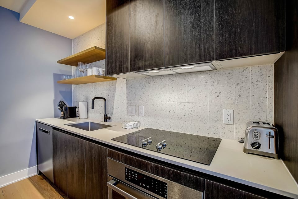 Luxury Condo, 2 Bedrooms, Balcony, City View | Private kitchen | Full-size fridge, microwave, stovetop, dishwasher