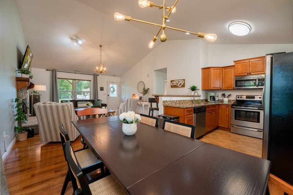 Open Floor Plan, complete with seating at the table for 6