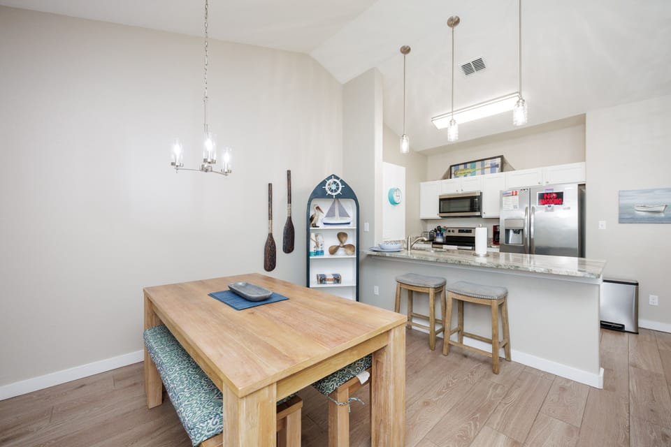 Your open-concept kitchen flows seamlessly into the dining area, perfect for gathering with loved ones over home-cooked meals.