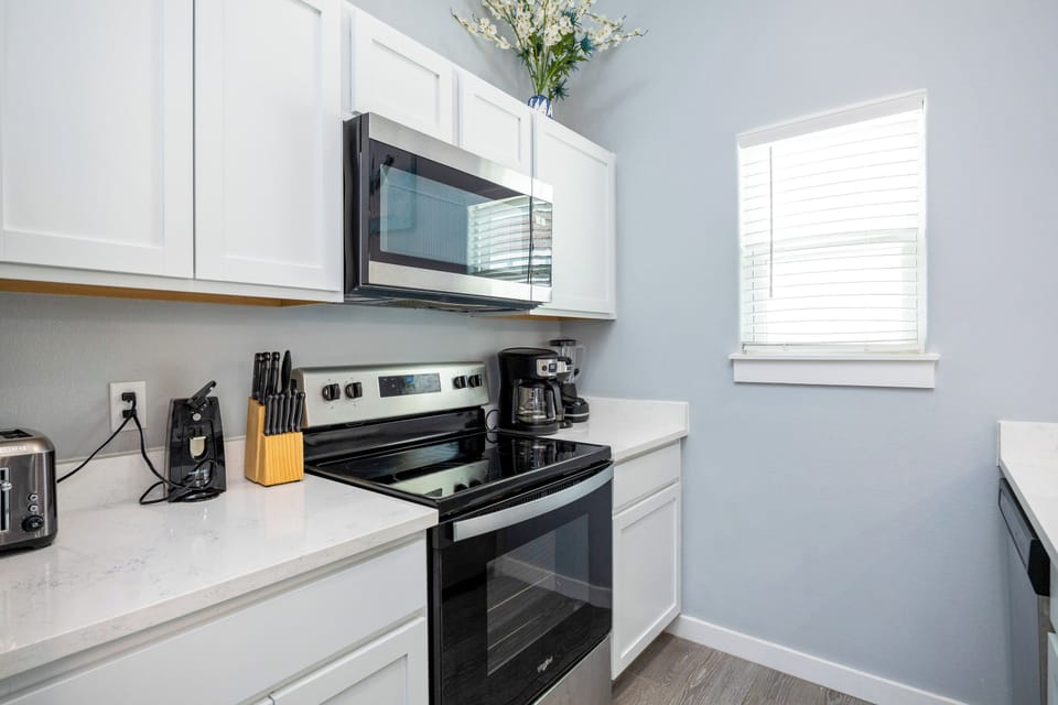 Your fully equipped kitchen makes meal prep a breeze with modern appliances, ample counter space, and everything you need for a comfortable stay.