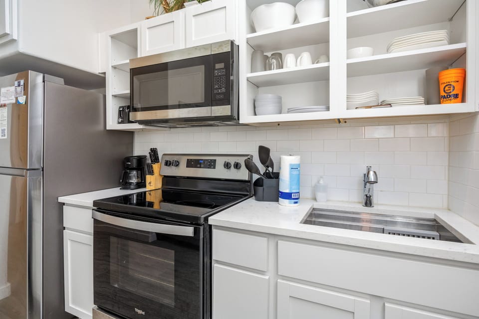Your fully equipped kitchen features modern appliances and ample storage, making it easy to prepare meals during your stay.