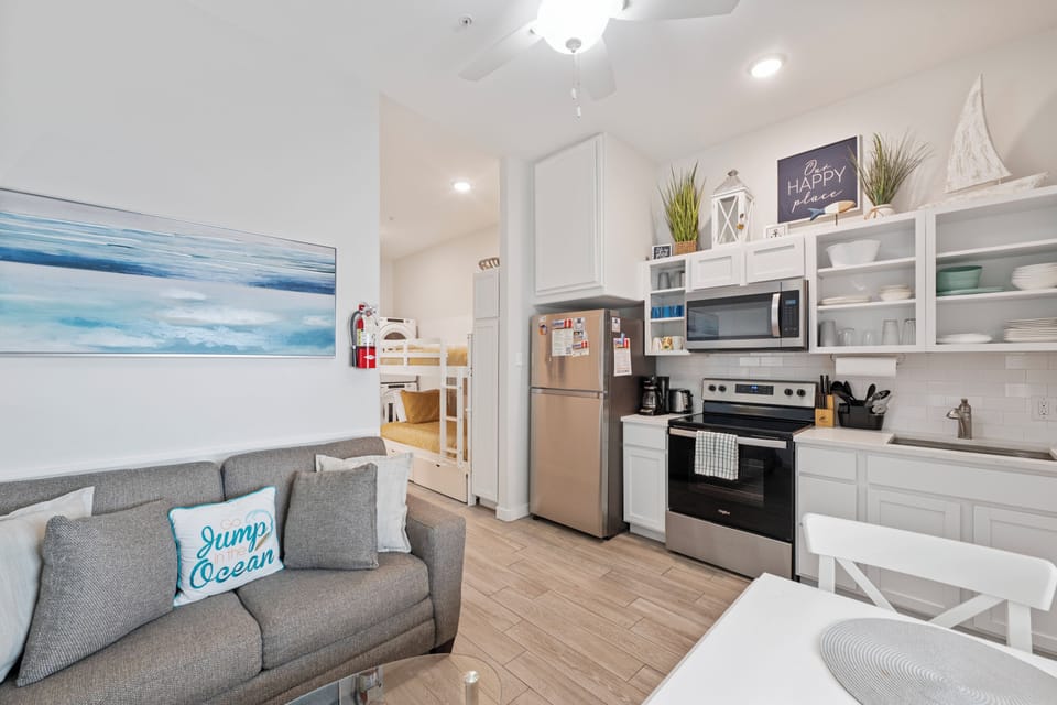 Relax in your bright, coastal-themed living space where ocean vibes meet modern comfort. Full kitchen awaits your culinary adventures.