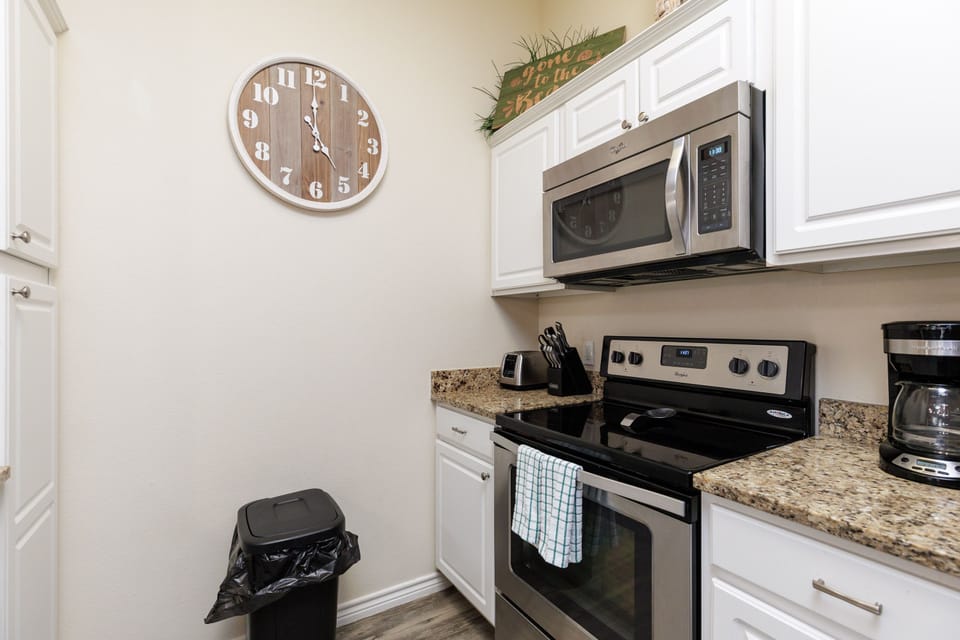 Your fully-equipped kitchen awaits with granite countertops, stainless steel appliances, and everything you need to create memorable meals during your stay.