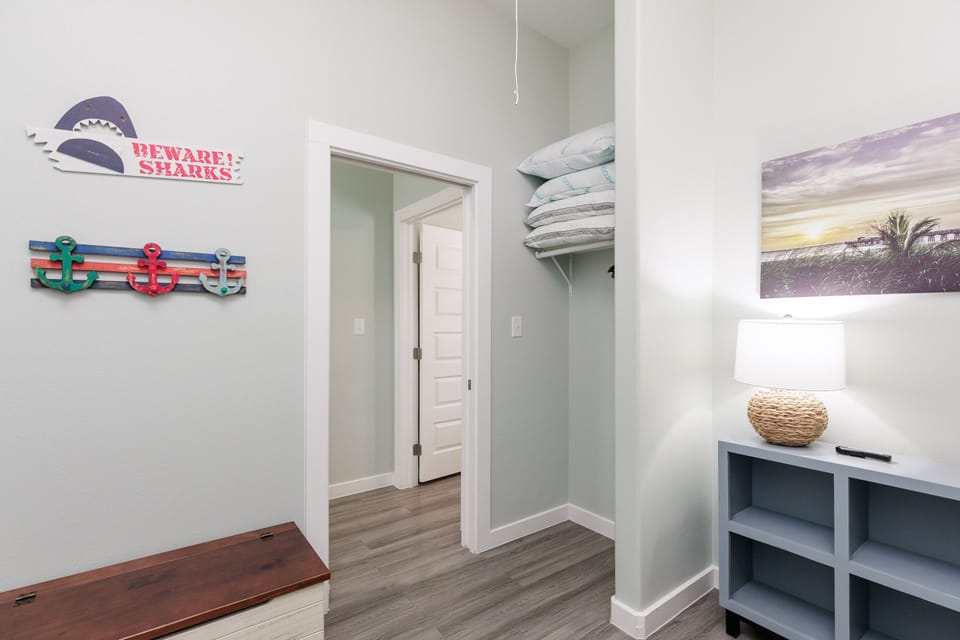 Your home base features coastal charm with beach artwork, organized storage, and thoughtful touches that make settling in effortless.