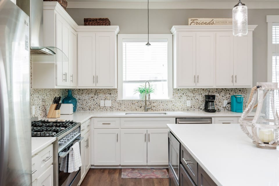 Cook your favorite meals in this bright, fully-equipped kitchen with modern appliances and plenty of counter space for your culinary adventures.