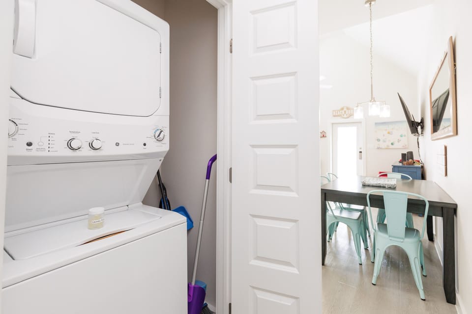 Handle your laundry effortlessly with your own private washer and dryer, perfectly tucked away yet easily accessible.