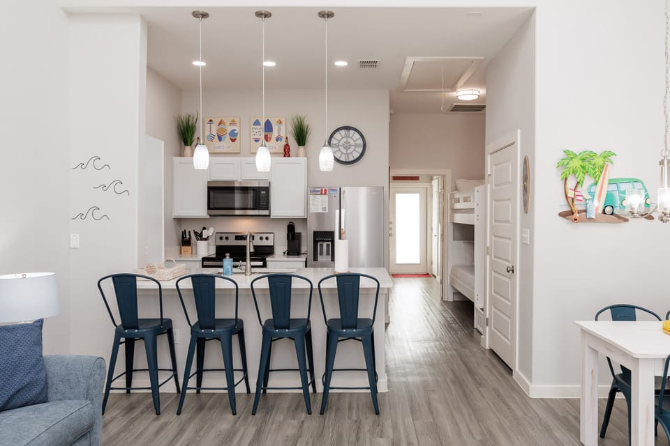 Your bright, open kitchen features modern appliances and a breakfast bar where you can start each day together.