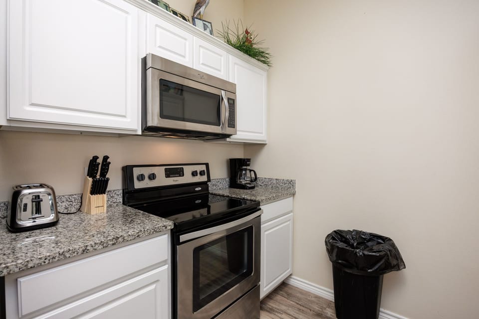 Your fully equipped kitchen features granite countertops, stainless appliances, and everything you need to whip up your favorite meals during your stay.