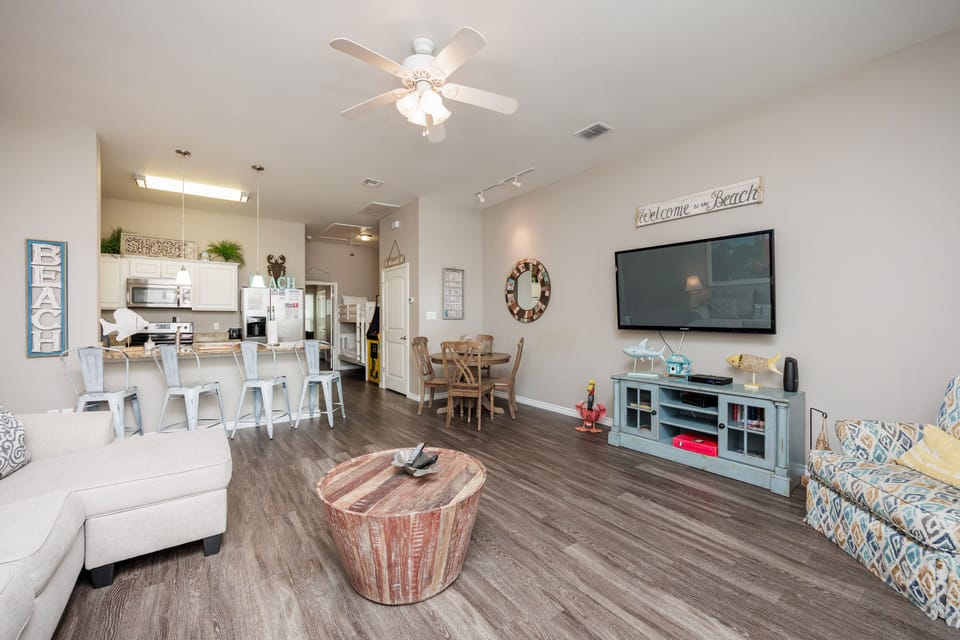 Your open-concept beach retreat welcomes you with coastal charm, modern comforts, and space to gather with loved ones.