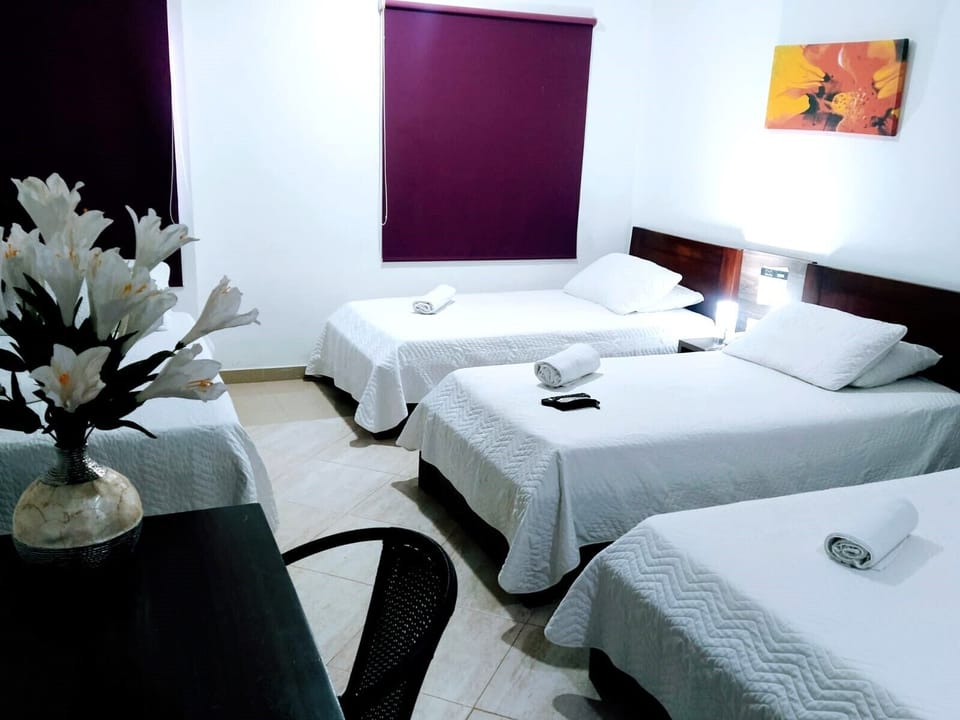 Quadruple Room | Down comforters, rollaway beds (surcharge), WiFi (free), bed sheets