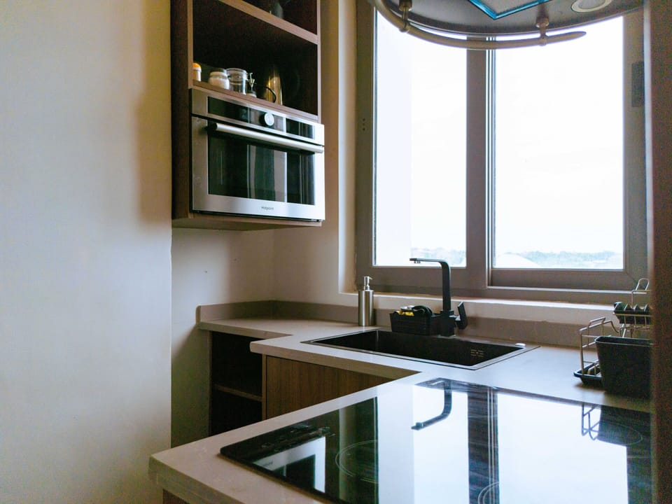 Deluxe Apartment, 3 Bedrooms, Balcony, Sea View | Private kitchen | Espresso maker, coffee/tea maker