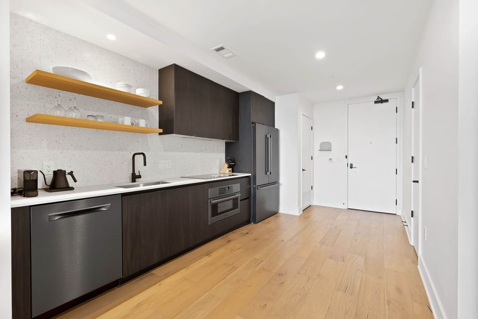 Luxury Condo, 1 King Bed with Sofa bed, Balcony, City View | Private kitchen | Full-size fridge, microwave, oven, stovetop