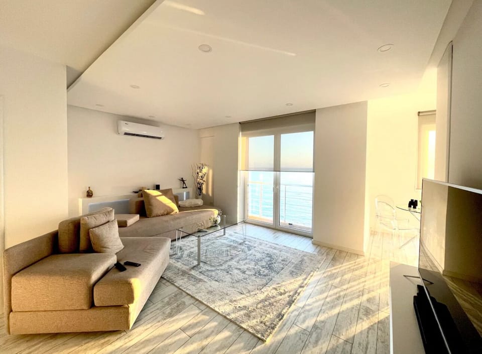 Panoramic Apartment | Living area | 50-inch LED TV with digital channels
