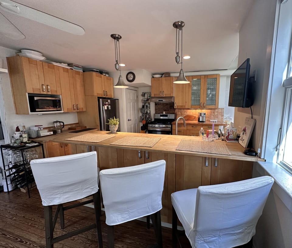 Open floor plan from Living room to Dining area and kitchen.