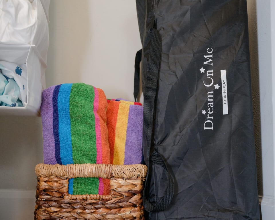 Packnplay with sheets. And beach towels in every bedroom!