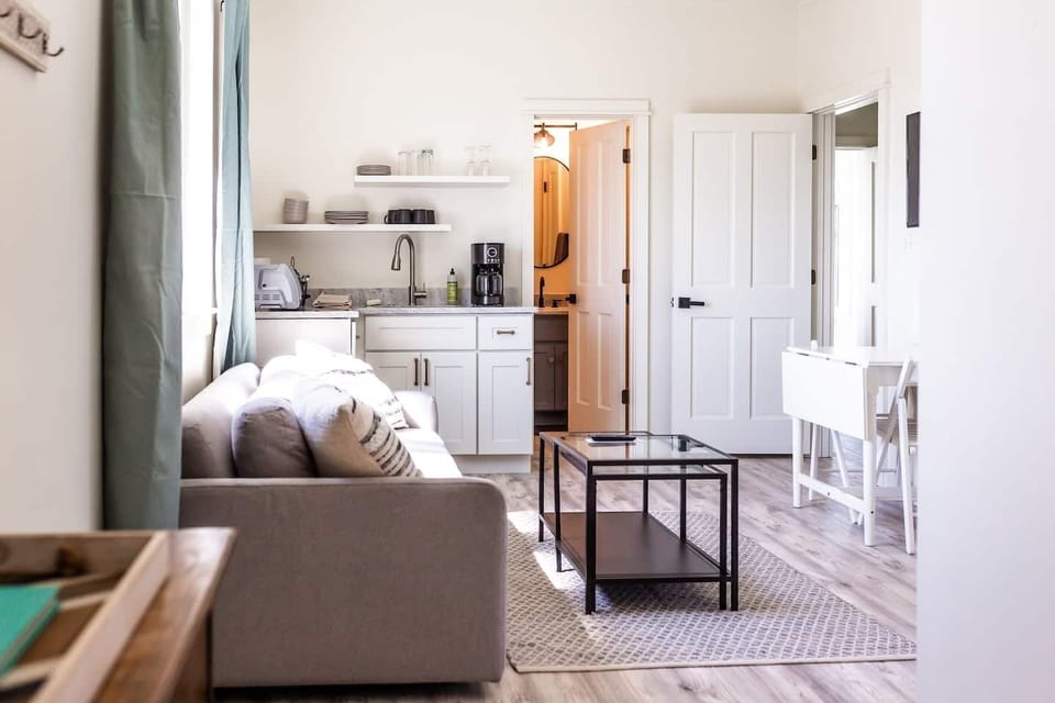Small living room / kitchenette on 3rd floor with separate entrance from the top deck.  Table seats 2-4