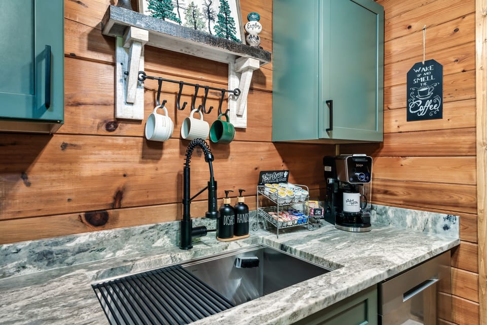 New cabinets, granite, appliances and quality cookware to prepare a nice meal.