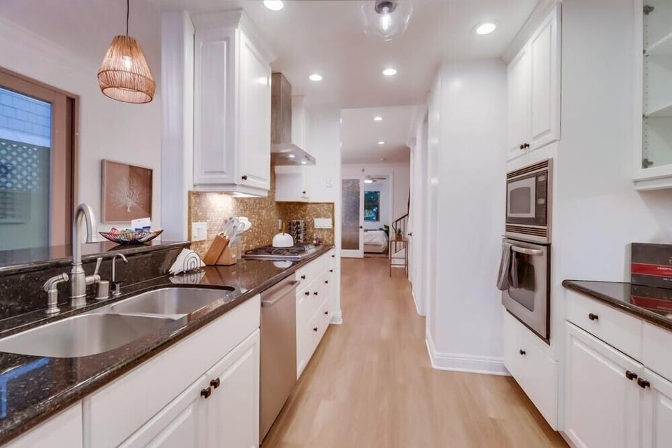 Enjoy preparing meals in the fully stocked kitchen, thoughtfully equipped with everything you need for effortless breakfasts, beach day snacks, and relaxed dinners at home.