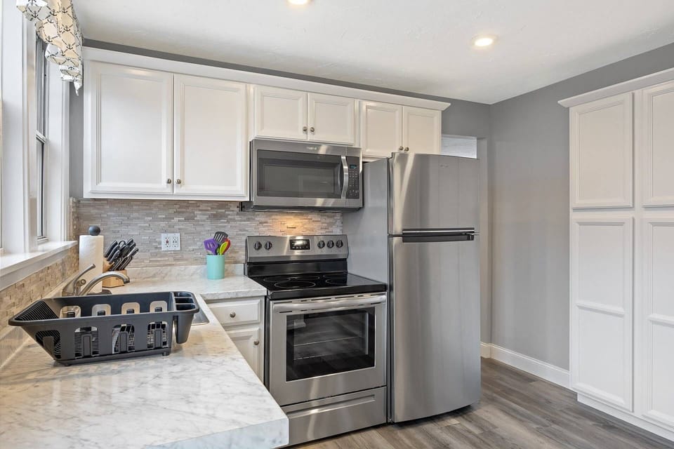 Another view of the kitchen appliances and lots of cabinet space for storage