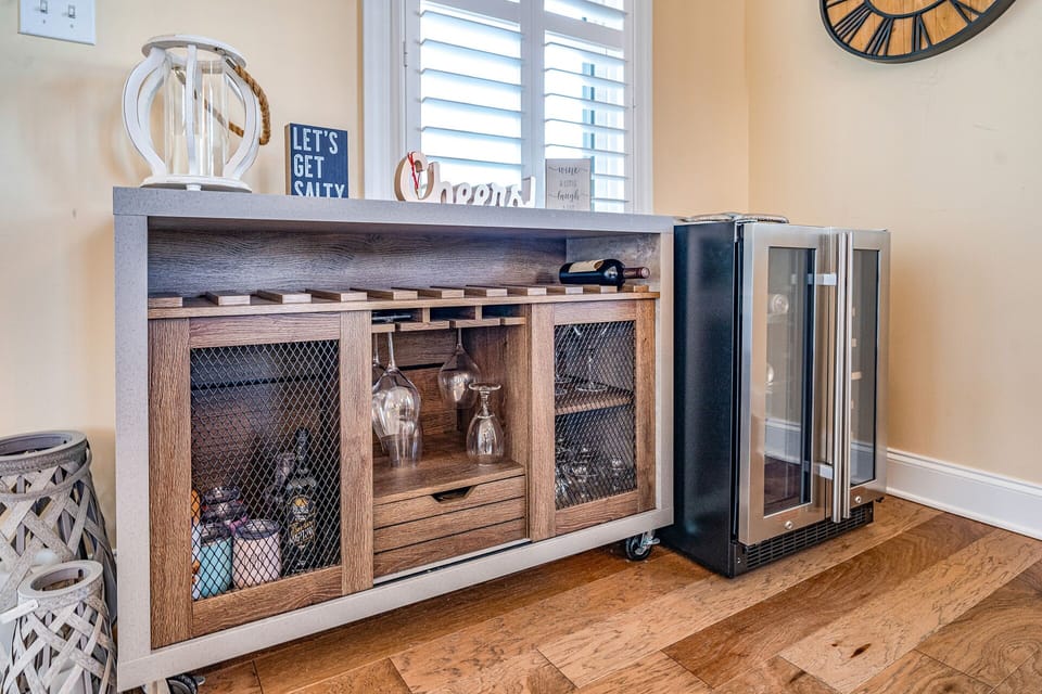Stylish home bar setup with wine fridge