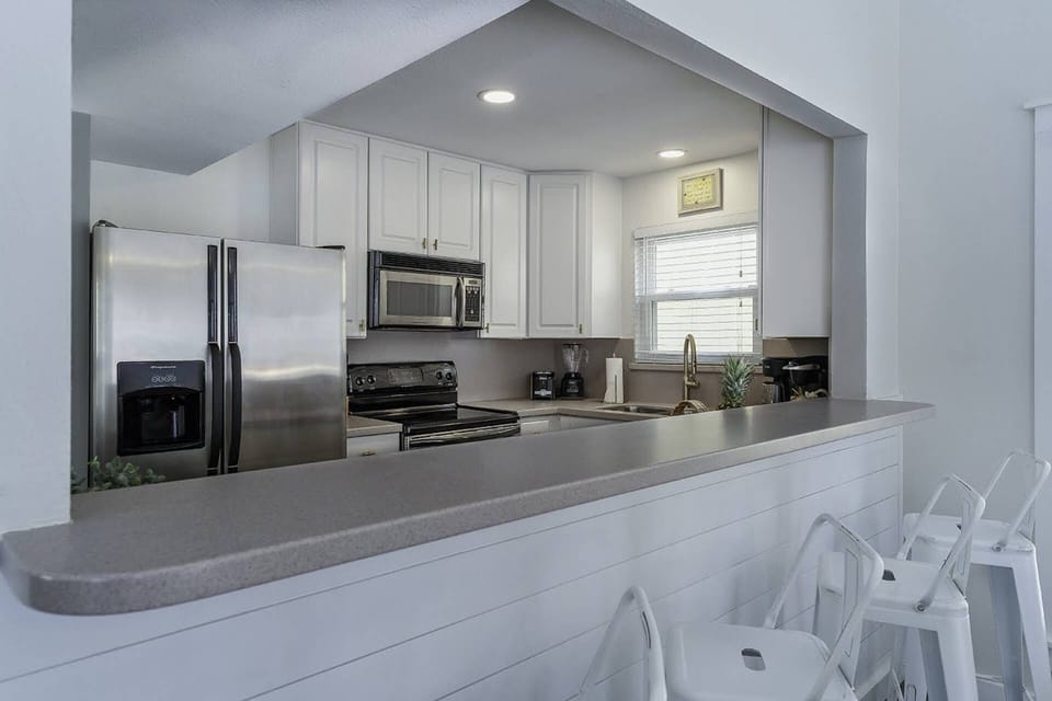 Kitchen with Stainless Steel Appliances overlooking Dining & Living Area ~ Great for the Family Chef & Sous Chef