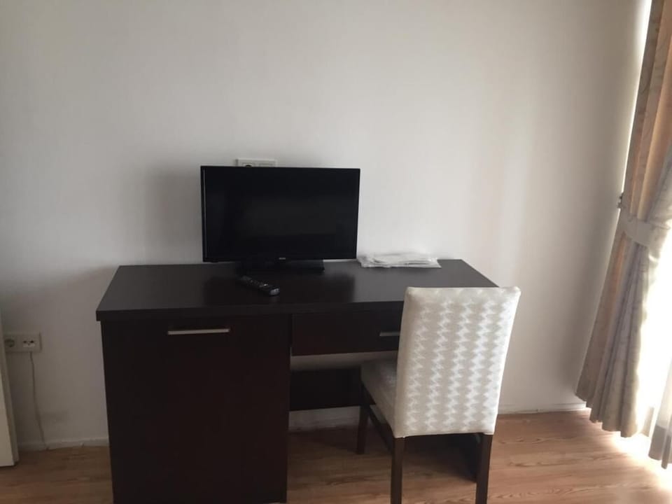 Classic Room, Smoking, City View | Desk, laptop workspace, blackout drapes, soundproofing