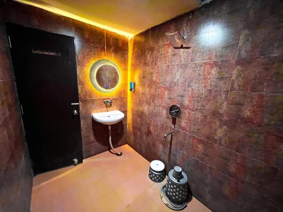 Shower, designer toiletries, slippers, soap