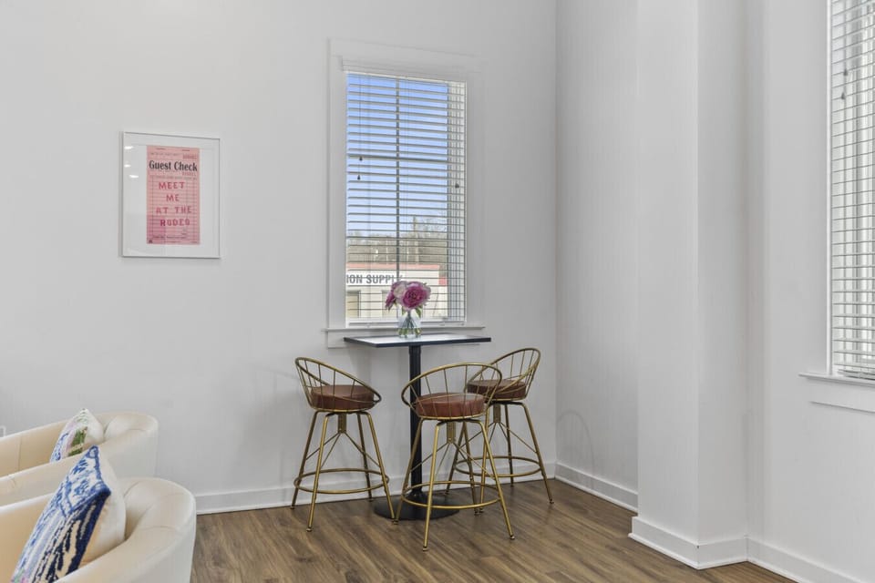 Living room with two comfy couches, a ceiling fan, and a Smart TV with all the streaming apps. Plenty of seating here & in the kitchen for your family to unwind.