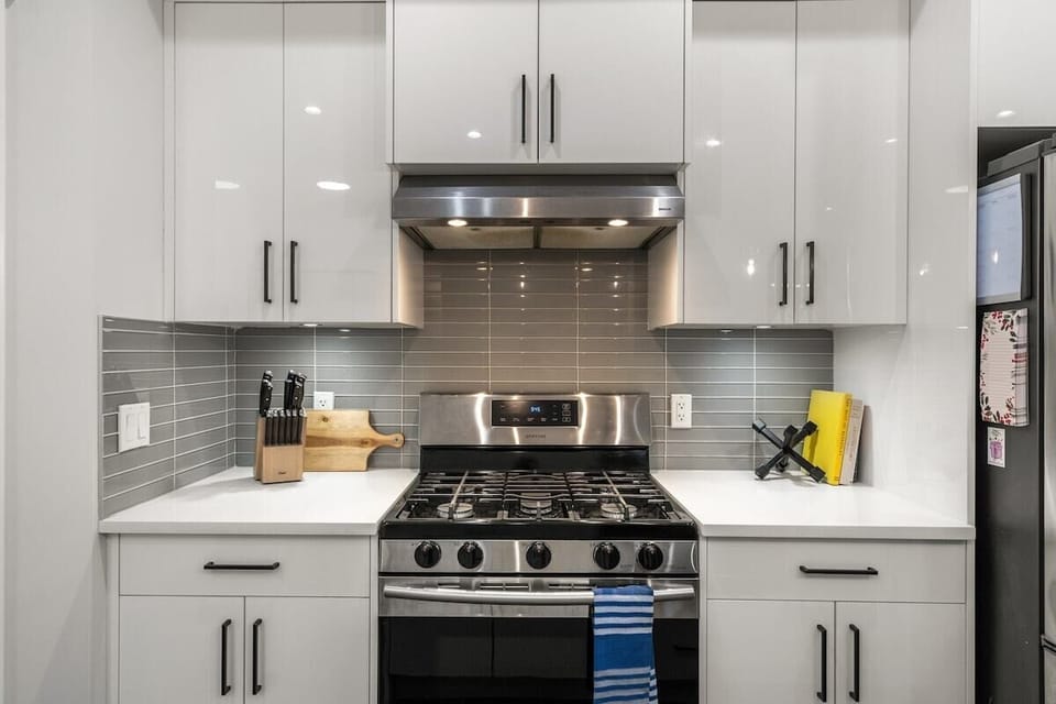 Guests will be invited to enjoy 
- Four level home 
- Four bedrooms 
- Four and a half bathrooms 
- Three separate living spaces 