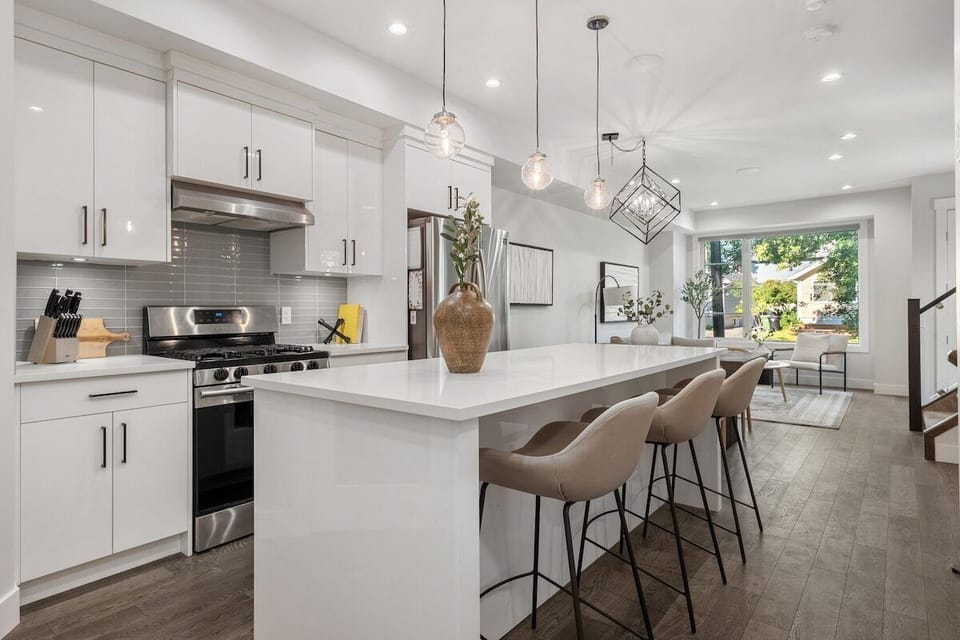 Guests will be invited to enjoy 
- Four level home 
- Four bedrooms 
- Four and a half bathrooms 
- Three separate living spaces 