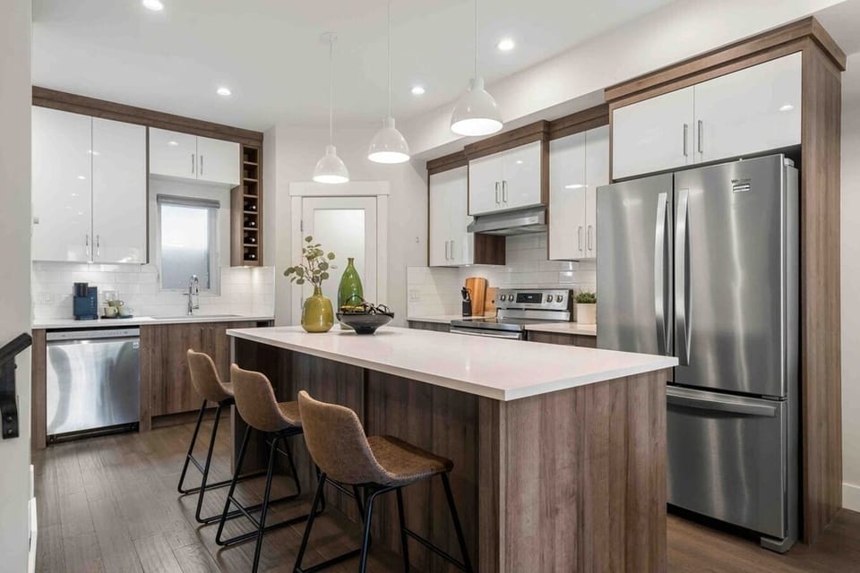 Guests will be invited to enjoy 
- Four level home 
- Four bedrooms 
- Four and a half bathrooms 
- Three separate living spaces 